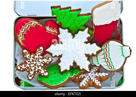 Festive iced gingerbread cookies in tin box. Stock Photo