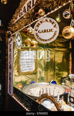 Market stall selling French creamy garlic mushrooms Stock Photo