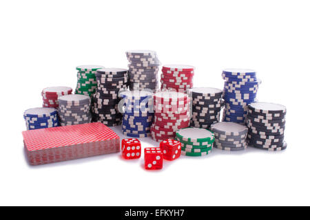 Poker chips whit cards and dices isolated on a white background Stock Photo