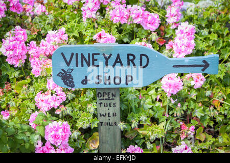 Blue sign for local vineyard shop on the Isles of Scilly Stock Photo