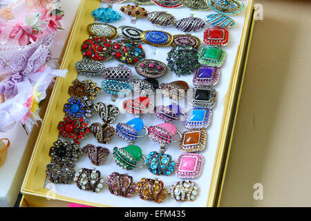 Colorful Jewelry, Rings on display at market stall Stock Photo