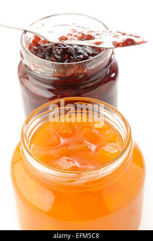 peach jam and raspberry jam Stock Photo