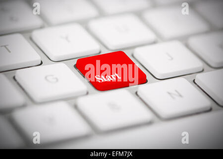 The word "START" written on metallic keyboard Stock Photo
