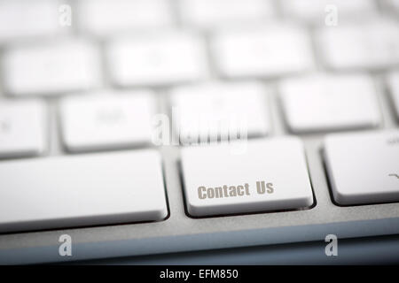 "Contact Us" on metallic keyboard Stock Photo
