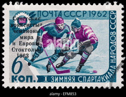 USSR - CIRCA 1962: A post stamp printed in USSR shows ice hockey, devoted to the 1st Winter Olympics of the USSR, circa 1962 Stock Photo