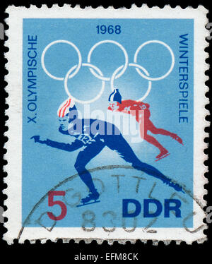 GDR - CIRCA 1968: A Stamp printed in GDR (East Germany) shows X Winter Olympic Games, 1968, circa 1968 Stock Photo