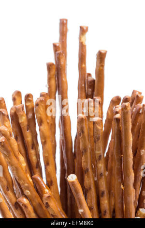 Closeup of many salt sticks, isolated on white background Stock Photo