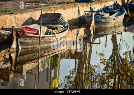 Traditional fishing boats in a small canal, Albufera, Valencia, Spain Stock Photo