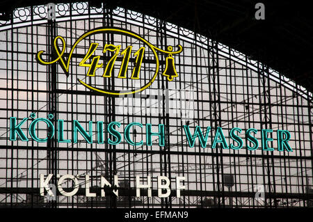 Advertisement for 4711 cologne set against end of Cologne main Railway Station Stock Photo
