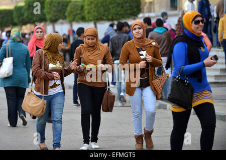 Cairo, Egypt. 7th Feb, 2015. Egyptian students walk at the cairo University during the first day of the second term of the 2014-15 academic year on February 7, 2015. Due to the escalation of students protest in the campus of several universities following the ouster of President Mohamed Morsi in July 2013, the Ministry of Education contracted a private security company to secure the gates of 15 universities across the country, including the campus of Al-Azhar University © Amr Sayed/APA Images/ZUMA Wire/Alamy Live News Stock Photo