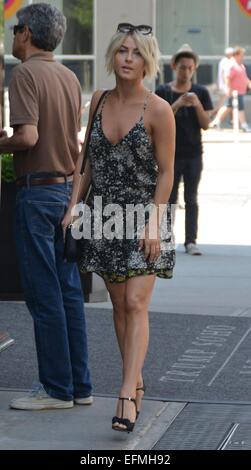 Julianne Hough, wearing a floral print dress and high heels, leaves her Manhattan hotel on a sunny day  Featuring: Julianne Hough Where: Manhattan, New York, United States When: 05 Aug 2014 Stock Photo