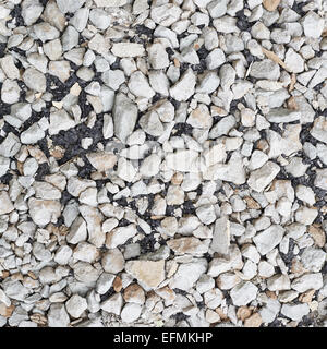 Stone pebbles mixed with asphalt Stock Photo