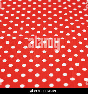 Red fabric with the white polka dots Stock Photo