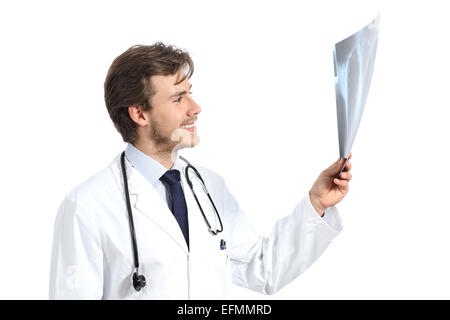 Handsome doctor man examining a radiography isolated on a white background Stock Photo