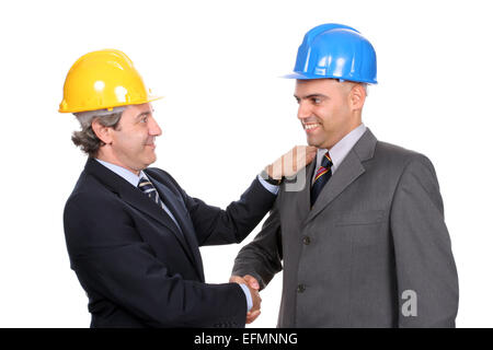 Two Engineers or Architects, closing new project, isolated in white background Stock Photo