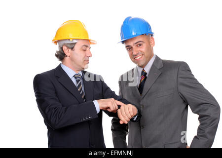 Two Engineers or Architects, discussing new project, isolated in white background Stock Photo