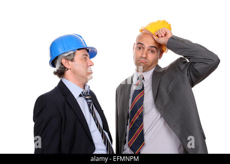 Two Engineers or Architects, discussing new project, isolated in white background Stock Photo
