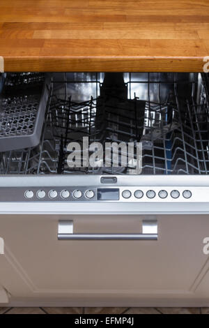 modern Half open empty dishwasher in a modern kitchen Stock Photo