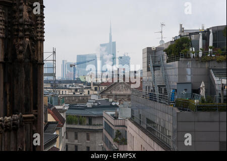 The skyline and skyscrapers seen from the rooftop of the cathedral, Milan, Italy Stock Photo