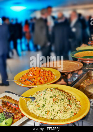 Catering service with lot of blurred people in background Stock Photo