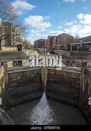 A lock on the Leeds Liverpool canal in the town of Wigan; near Wigan Pier. Stock Photo