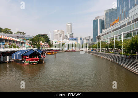 Boats on the Singapore river at Clarke Quay in Singapore. Stock Photo