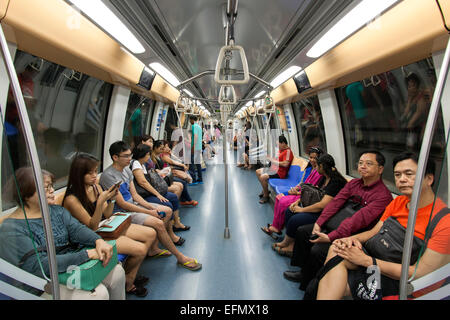 Interior of a carriage of the Singapore MRT (Mass Rapid Transit) system. Stock Photo