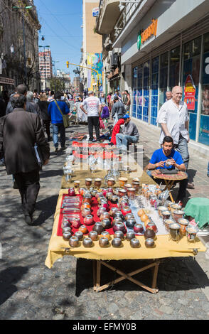 Colourful souvenir stall in popular Calle Florida (Florida Street), one of the main popular shopping streets in downtown Buenos Aires, on a sunny day Stock Photo