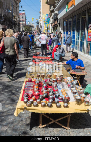 Colourful souvenir stall in popular Calle Florida (Florida Street), one of the main popular shopping streets in downtown Buenos Aires, on a sunny day Stock Photo