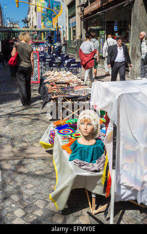 Souvenir stall in popular and busy Calle Florida (Florida Street), one of the main shopping streets in downtown Buenos Aires, on a sunny day Stock Photo