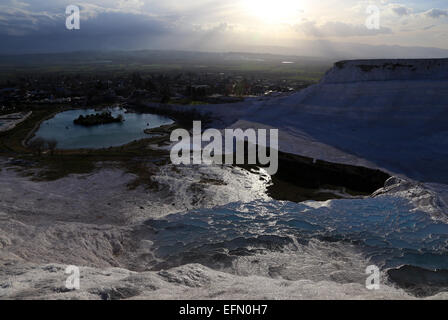 Denizili. 7th Feb, 2015. Photo taken on Feb. 7, 2015 shows the view of Pamukkale. Pamukkale, meaning 'cotton castle' in Turkish, is a natural site in Denizli Province in southwestern Turkey and contains hot springs and travertines, terraces of carbonate minerals left by the flowing water. It is in total about 2,700 meters long, 600 meters wide and 160 meters high. Pamukkale was recognized as a World Heritage Site in 1988. Credit:  Zou Le/Xinhua/Alamy Live News Stock Photo