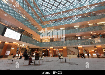 Japan Post (JP) Tower shopping mall with glass roof in Maranouchi, Tokyo, Japan Stock Photo