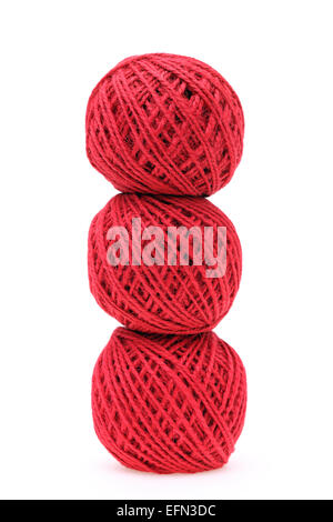 Ball of red threads on white background Stock Photo
