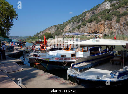 Dalyan Tekne Kooperatifi excursion boats moored on the riverside, Dalyan, Turkey Stock Photo