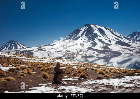 Miniques Volcano and lagoon in San Pedro de Atacama desert, Chile, South America Stock Photo