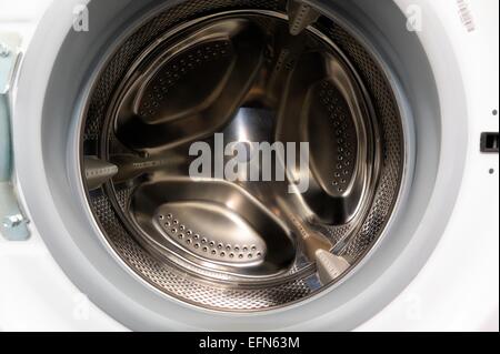 A chrome automatic washing machine drum Stock Photo