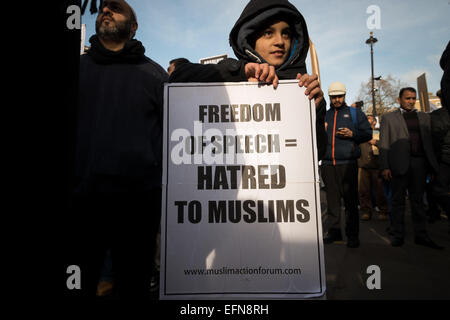 London, UK. 08th Feb, 2015. Hundreds of Muslims from London and another cities in UK came to Downing Street today to protest against reprinting of the cartoon of Holy Prophet Muhammad. Pictures of the Prophet Muhammad are forbidden in Islam due to the central tenet that Muhammad was a man, not a god, and that portraying him could lead to revering a human in lieu of Allah. Credit:  ZUMA Press, Inc./Alamy Live News Stock Photo