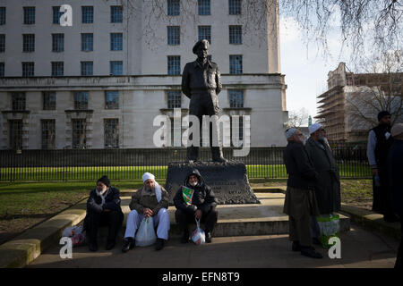 London, UK. 08th Feb, 2015. Hundreds of Muslims from London and another cities in UK came to Downing Street today to protest against reprinting of the cartoon of Holy Prophet Muhammad. Pictures of the Prophet Muhammad are forbidden in Islam due to the central tenet that Muhammad was a man, not a god, and that portraying him could lead to revering a human in lieu of Allah. Credit:  ZUMA Press, Inc./Alamy Live News Stock Photo