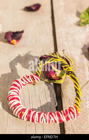 Heart on a dry roses Stock Photo