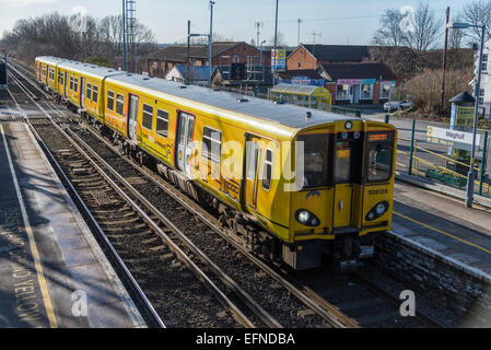 Merseyrail Electrics train at Maghull station. Stock Photo