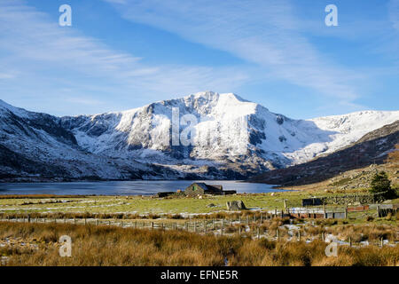 View along Ogwen Valley to Y Garn mountain with snow in mountains of Snowdonia National Park (Eryri) in winter, North Wales, UK, Britain Stock Photo