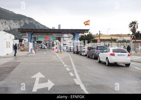 Gibraltar rock Cars queuing in front of border Spain, Gibraltar to pass customs. La Linea, Andalusia, Spain. Stock Photo