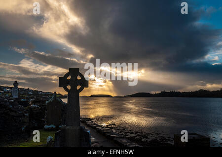 Old Abbey Cemetery and Donegal Bay in dramatic evening light at Donegal Town County Donegal Ireland Stock Photo