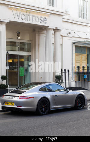 Porsche parked outside Waitrose in Chelsea London England Stock Photo