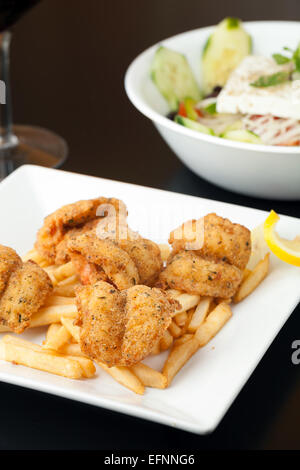 Fried Shrimp and Fries Stock Photo