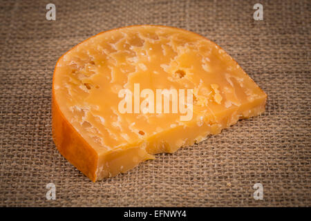 Italian Cheese on hessian background close up Stock Photo