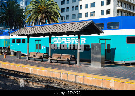 Public benches and the COASTER commuter train. San Diego, California, United States. Stock Photo