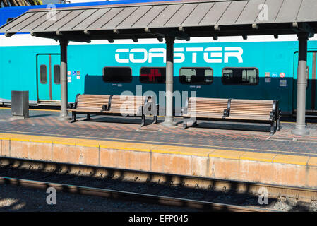 Public benches and the COASTER commuter train. San Diego, California, United States. Stock Photo