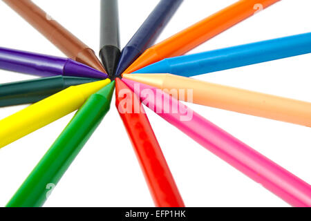 Set of wax crayons pointing to the center on white background Stock Photo