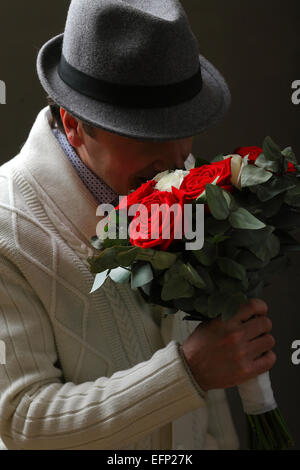 lover with a bouquet of roses Stock Photo